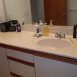 clean bathroom with loads of storage space